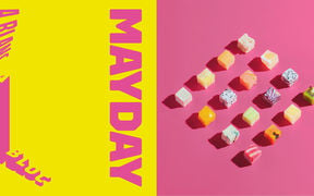 On the left, A Blanc and A Bloc written in pink letters on yellow background and colourful candy cubes on pink background on the right