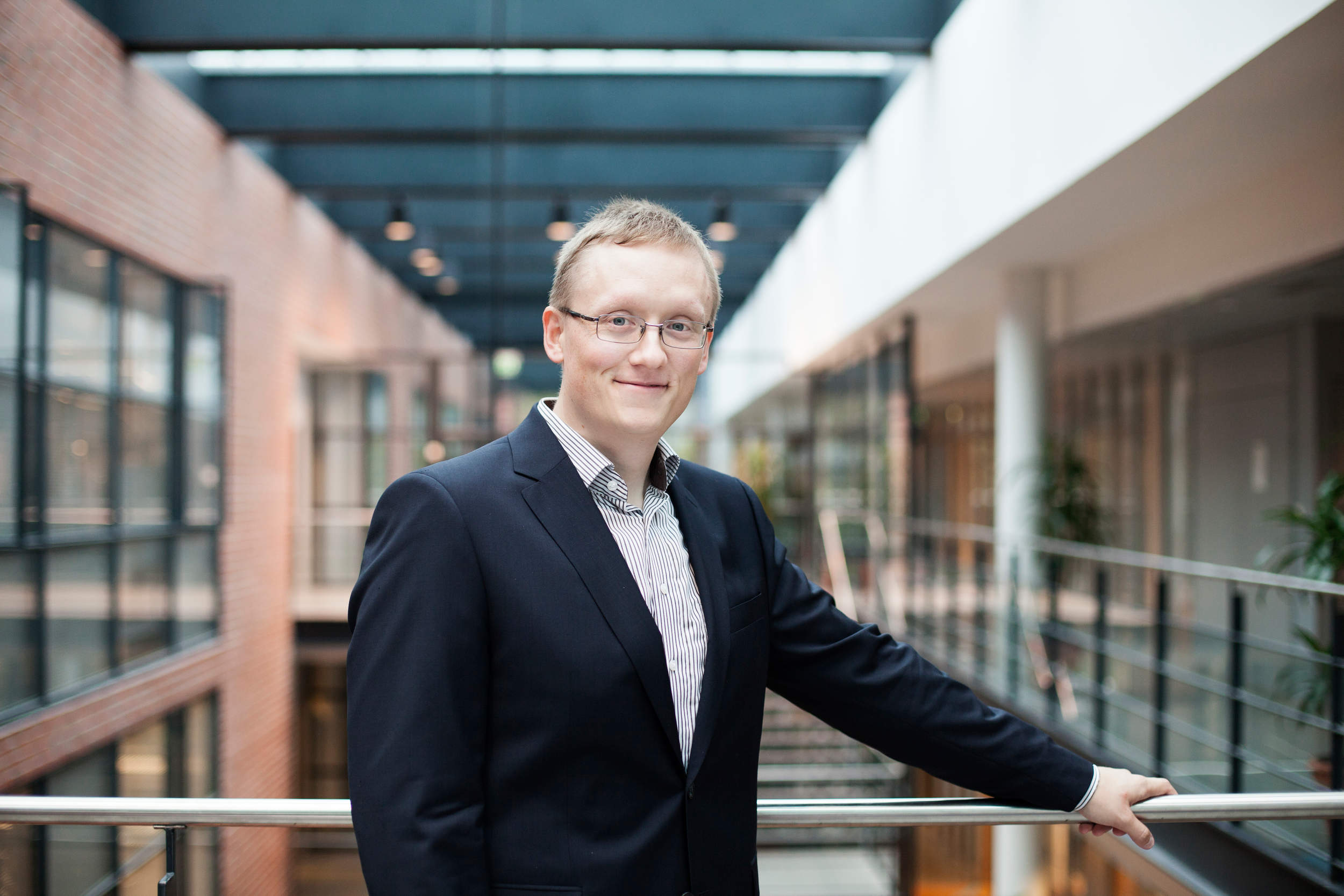 Antti at Aalto Unviersity smiling towards the camera