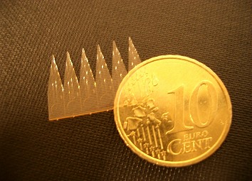 CHEM_Microfabrication group_SU-8 ESI array with coin