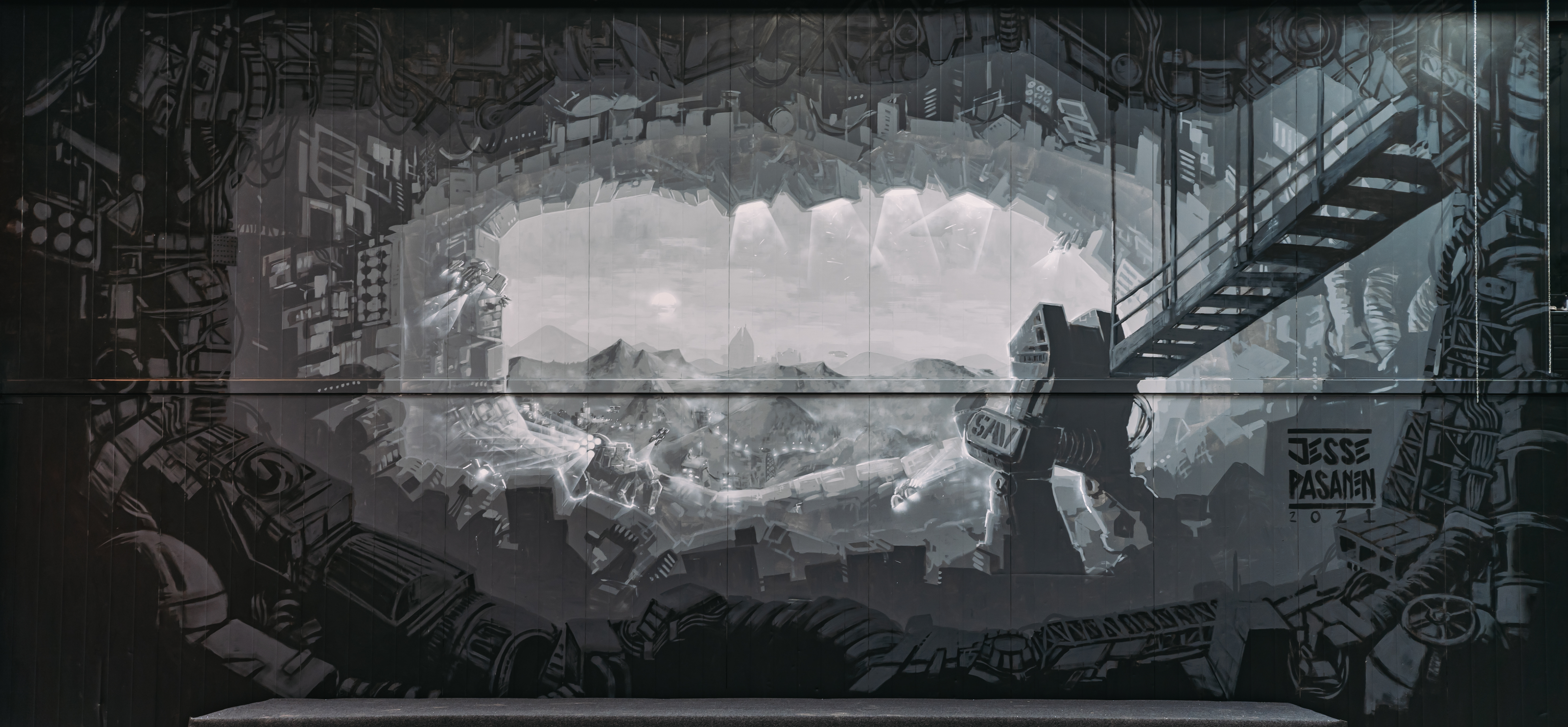 Jesse Pasanen greyscale painting of a view out from rubble into a distance landscape
