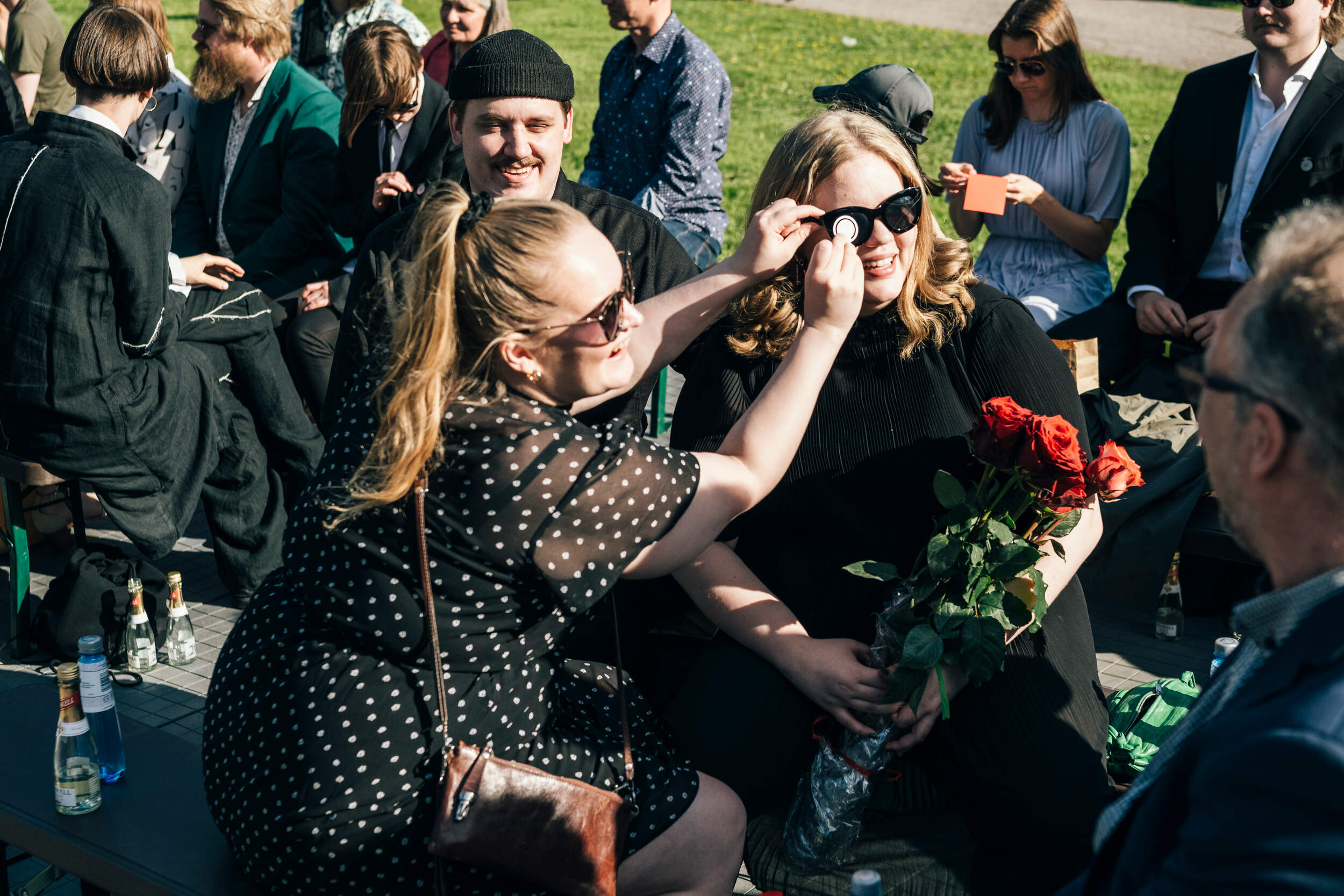 New graduates smiling and laughing together 