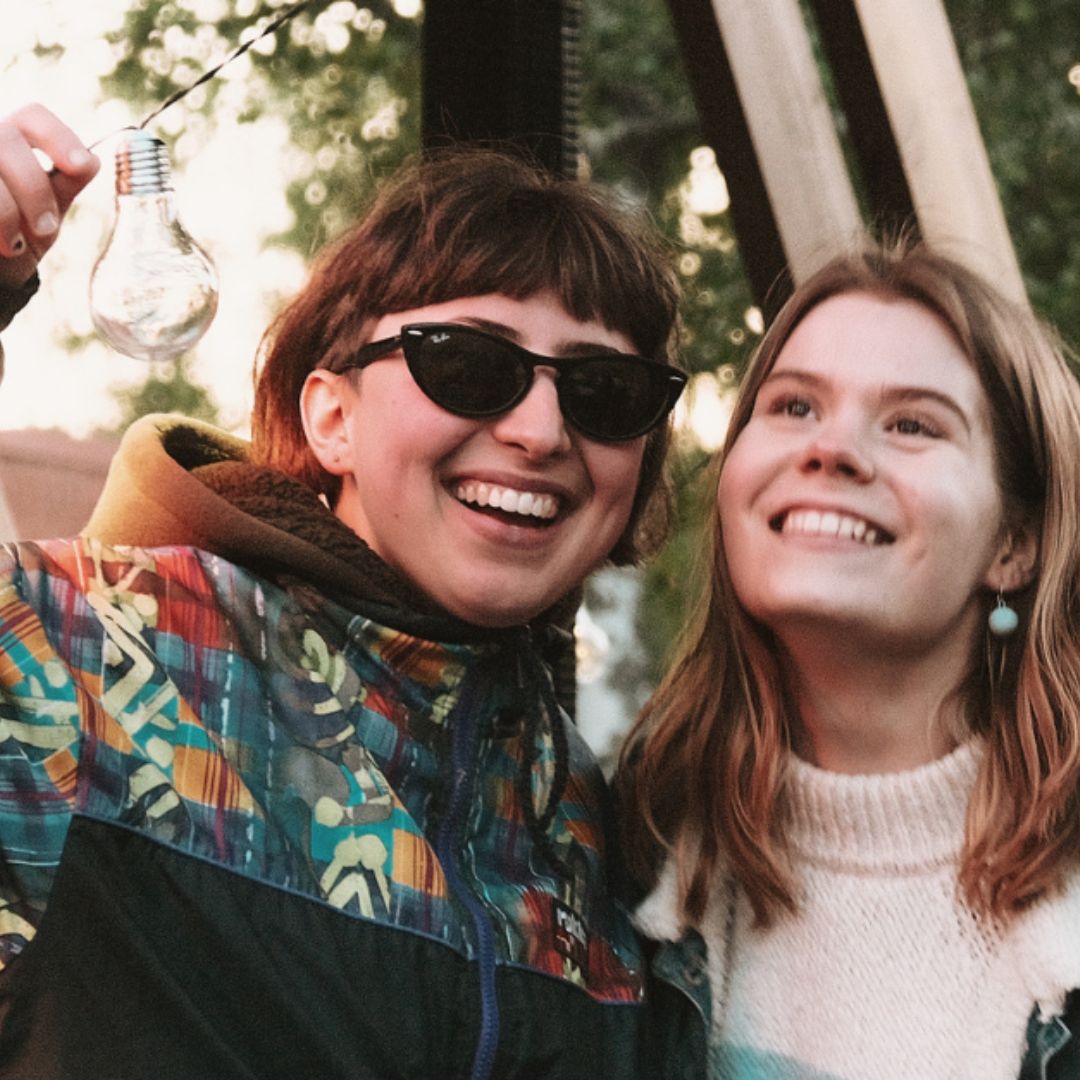 Two people smiling at the Test Site Summer Opening Party. Photographer: Adela Navratilova