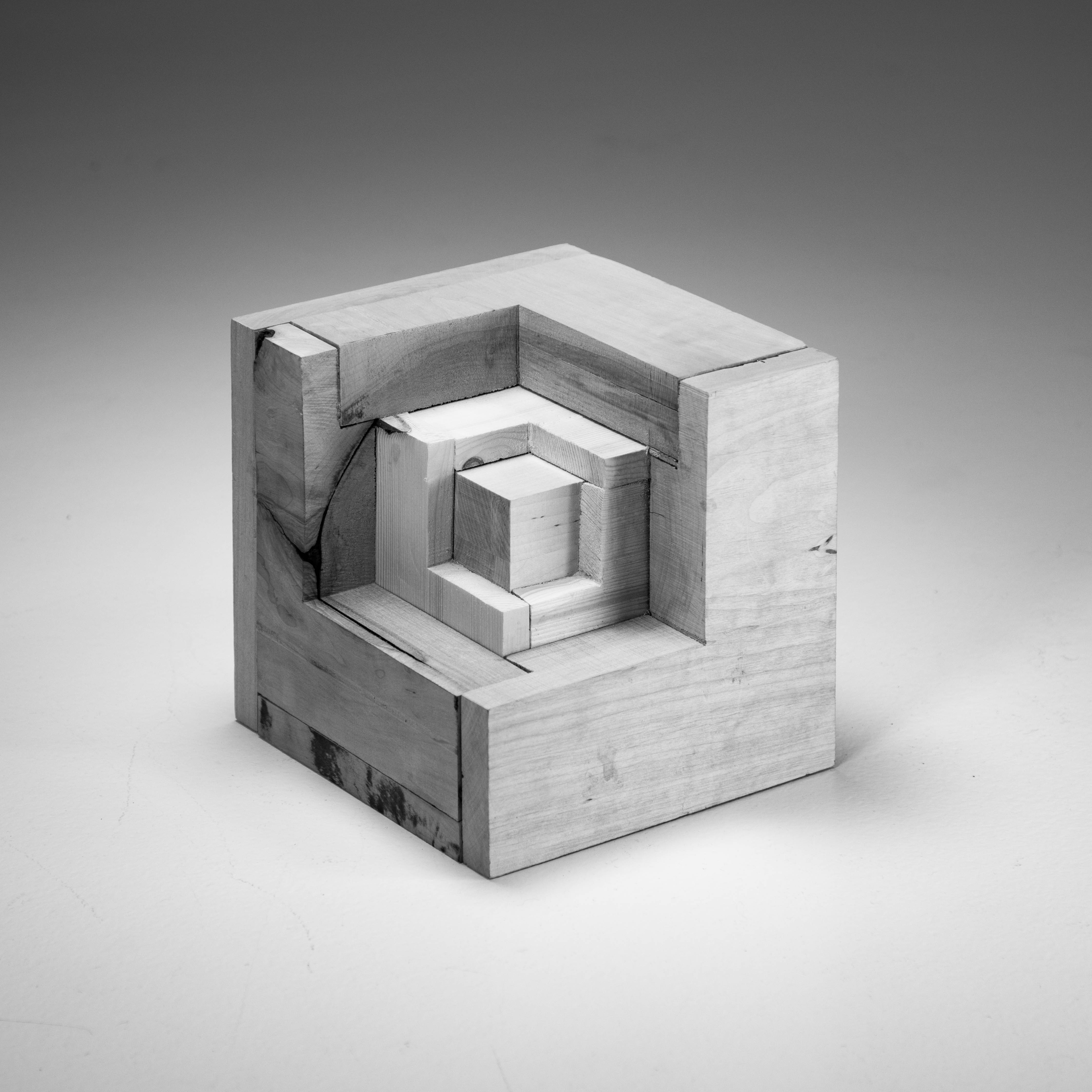 cube consisting of different species timber, the amount used corresponding to the amount of forest of that species in Finland