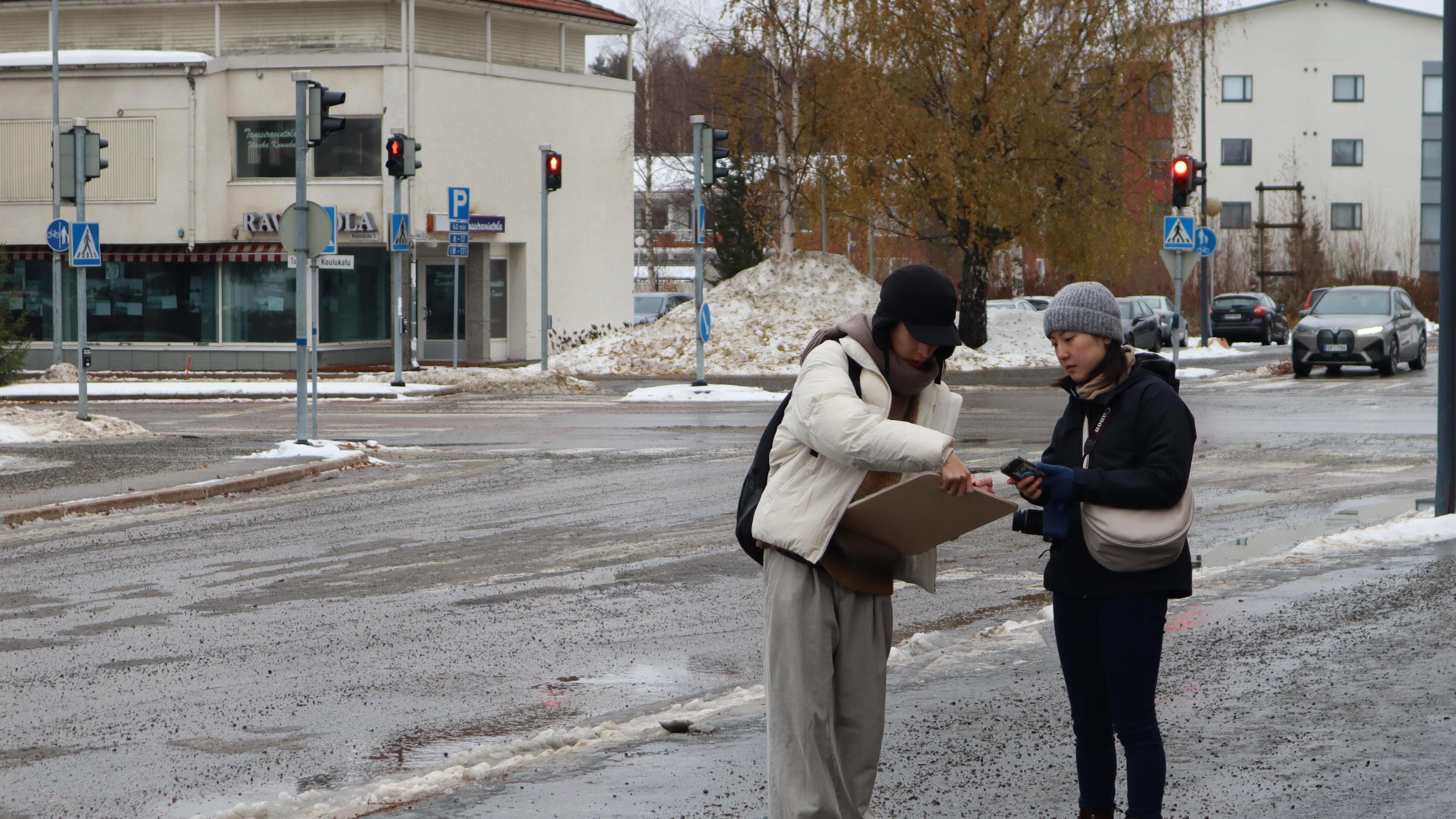 Students measuring surroundings