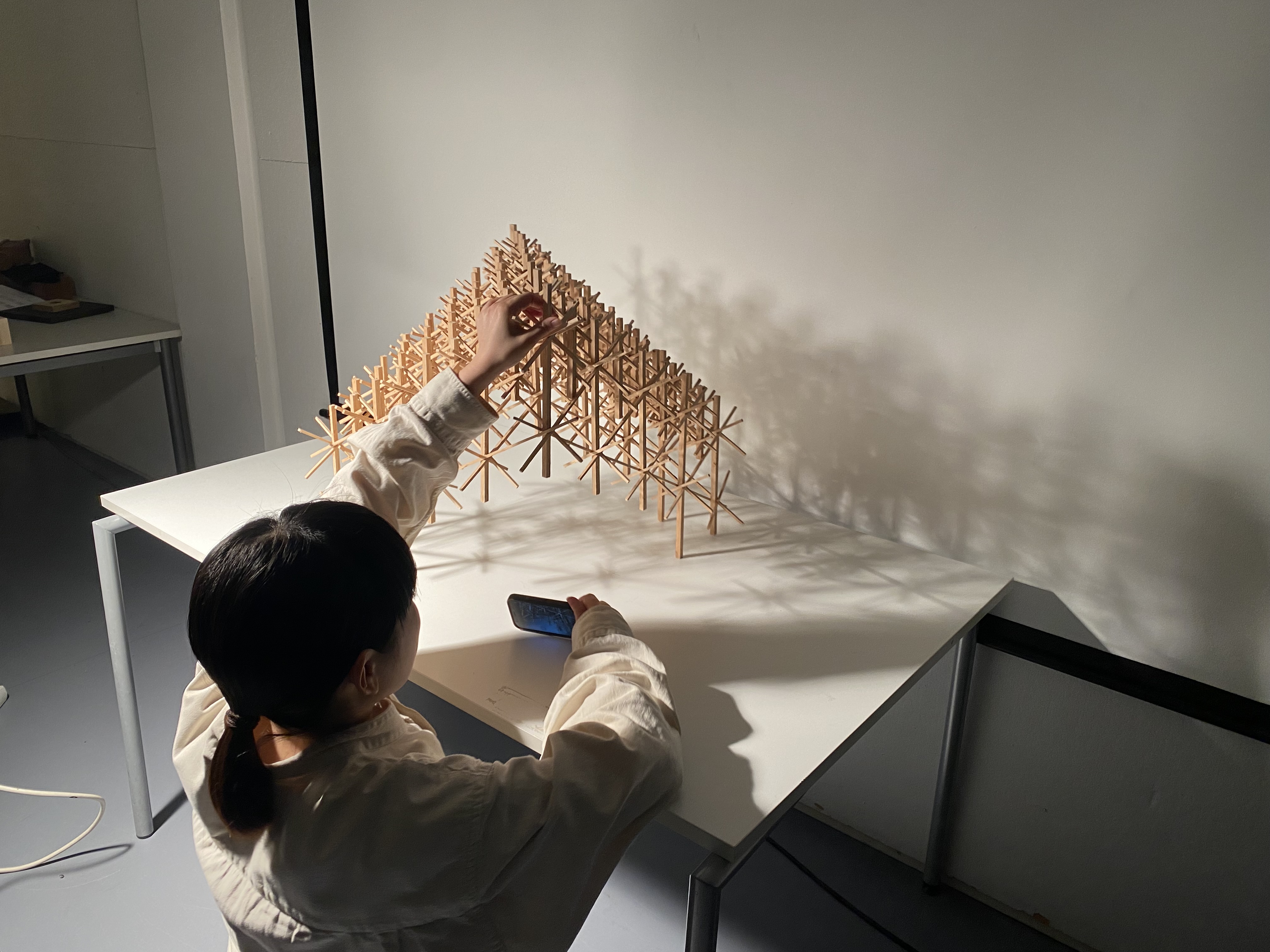 Student working on scale 1 to 20 model
