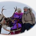 Photo of two women and reindeers in Nenets Region of Russian Arctic