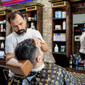 Barber cutting hair
