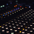 Mixing table with lights on.