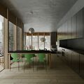 Modern kitchen and dining area with wooden floor, black countertops, green chairs, and large windows.