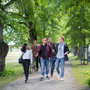 Students walking on the Aalto campus in the spring. Photo by Aalto University