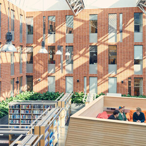 Students sitting in sofas in a light space