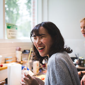 A happy Aalto University student smiling towards the camera.