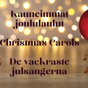 De vackraste julsångerna med röd julkula och musikalnoter på oskarp ljusbakgrund.