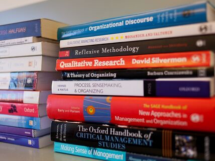 Two stacks of business books