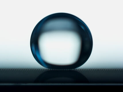 Water droplet suspended on a micropillar surface