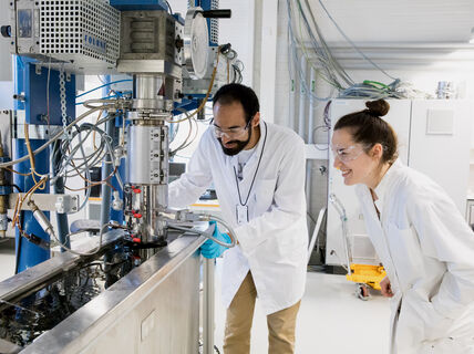 Two people in a laboratory