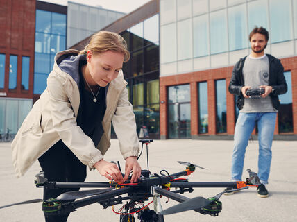 Students of Aalto University in campus area with a drone / Photo by Aalto University, Unto Rautio