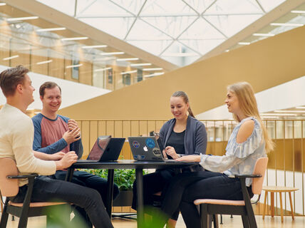 Students studying in the new BIZ building - Photo by Unto Rautio