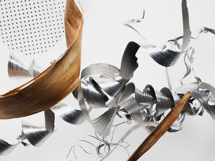 An abstract composition of different metals and forms.