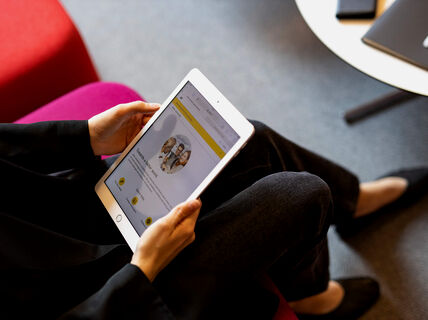 A Person with an ipad