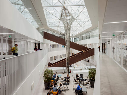 People sitting around tables