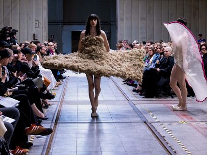 The winning collection by Ruusa Vuori at Aalto University's fashion show Näytös23, a model walking on the catwalk  