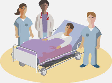 Patient and healthcare professionals at hospital