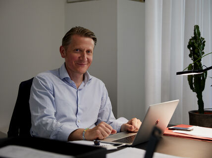 Professor Marco Steinberg behind his desk