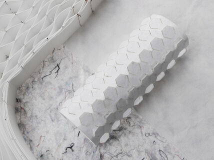 Collection of white and grey nonwoven fabrics