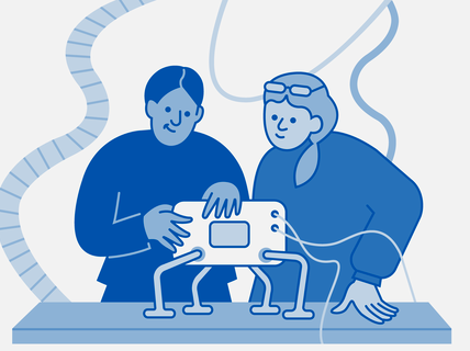 Kaksi henkilöä työstää robottia.