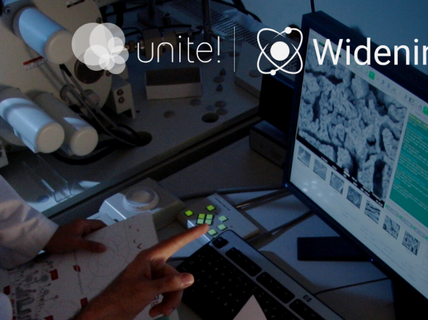 Person in lab coat points at a computer screen displaying microscopic images. Unite! and Widening logos are visible.