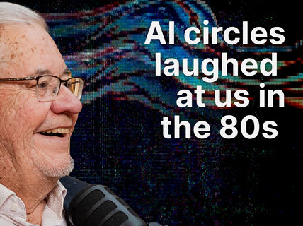 Smiling elderly man with glasses at a microphone, abstract blue and red digital waves and text about AI in the 80s