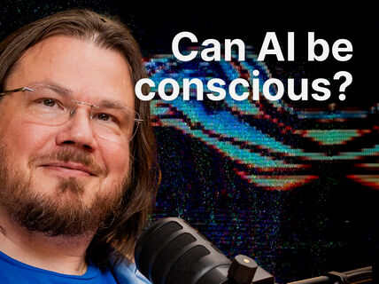 Bearded man with glasses by a podcast mic, abstract digital waves and text: Can AI be conscious?