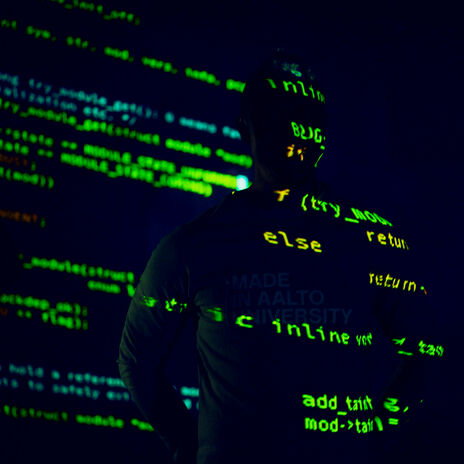 An illustration image with code and a human against a dark background.