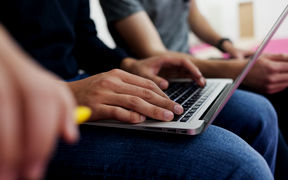 Student at laptop. Photo by Aalto University / Aino Huovio
