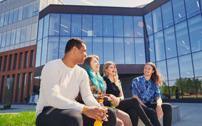 Aalto University students enjoying sunny weather