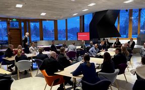 Participants discussing the topic of the event. 