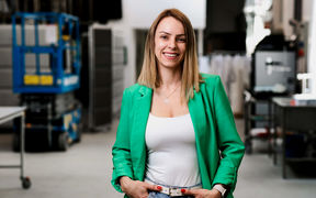 Professor Dessbesell in a lab, wearing a green jacket