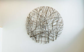 Art work of twigs forming a web