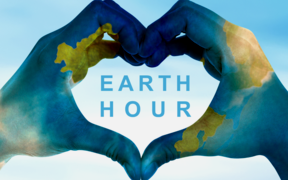 Kädet muodostavat sydämen keskellä teksti Earth Hour