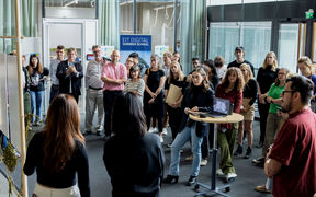 Students and staff discussing
