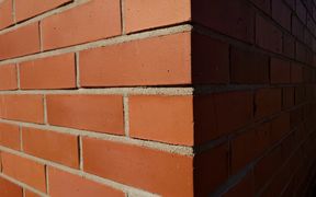 Tile wall with shadow on one side