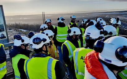 EMC students wearing helmets on a mining site
