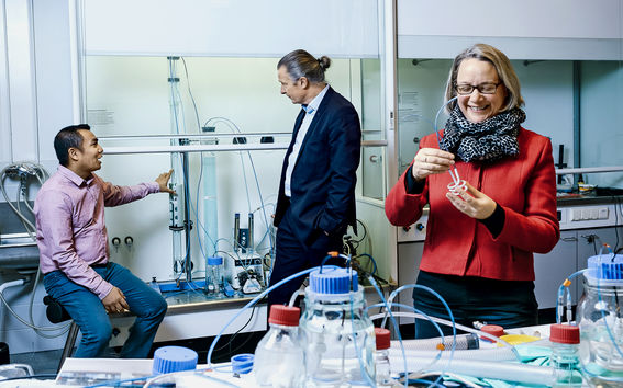 Surendra Pradhan (on the left), Riku Vahala and Anna Mikola are testing the new method in the water laboratory. Photo: Jaakko Kahilaniemi.