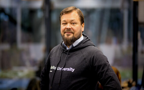 Ville Jokela Aalto CRE Managing Director smiling to the camera, wearing Aalto University hoodie. Pic: Kalle Kataila / Aalto University