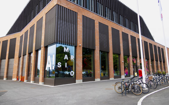 Marsio building seen from the outside, Marsio text and Aalto logo in the window