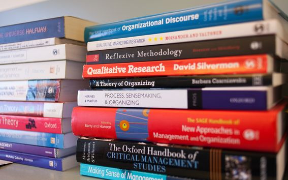 Two stacks of business books