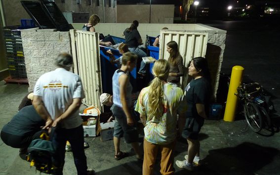 The photo shows dumpster divers