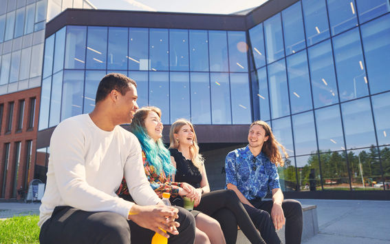 Students in front of School of Business