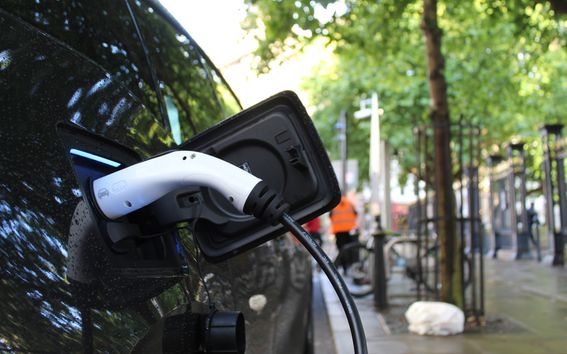 Electric vehicle charging. Photo by Andrew Roberts on Unsplash